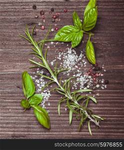 Scattered fresh basil and rosemary, sea salt and dry peppercorns