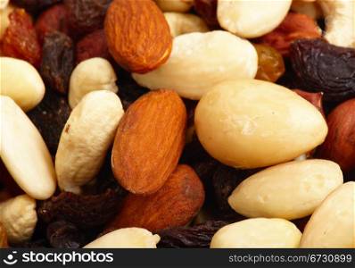 Scattered miscellaneous nuts on white background. Close-up