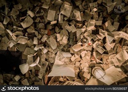 Scattered papers - Many papers, newspaper clippings, letters and more scattered on the ceiling
