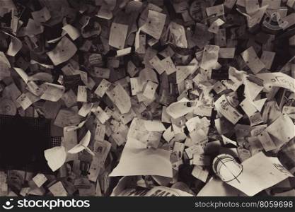 Scattered papers - Many papers, newspaper clippings, letters and more scattered on the ceiling