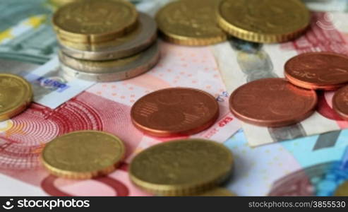 Scattered Pile Of Euro Banknotes And Coins.aShot Slider.