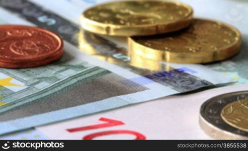 Scattered Pile Of Euro Banknotes And Coins.aShot Slider.