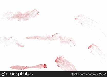 Scattered powder. Abstract image with pink powder on white background