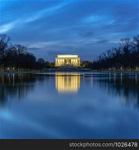 Scene of Abraham Lincoln Memorial at the twilight time with reflection, Washington DC, United States, history and culture for travel concept