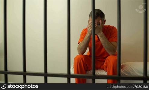 Scene of an ashamed inmate in prison