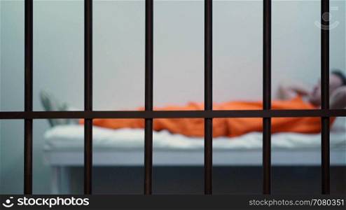 Scene of an inmate in a jail or prison