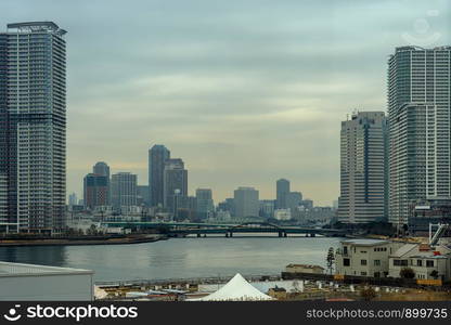 Scene of Building cityscape with bridge in twilight time around Odaiba area, Tokyo, Japan