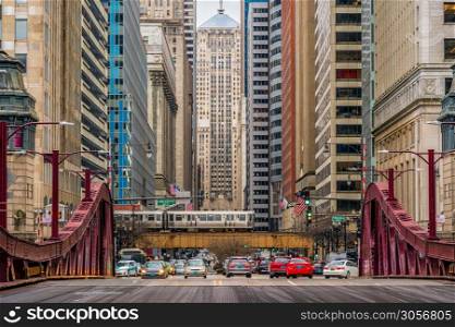 Scene of Chicago street bridge with traffic among modern buildings of Downtown Chicago at Michigan avenue in Chicago, Illinois, United States, Business and Modern Transportation concept