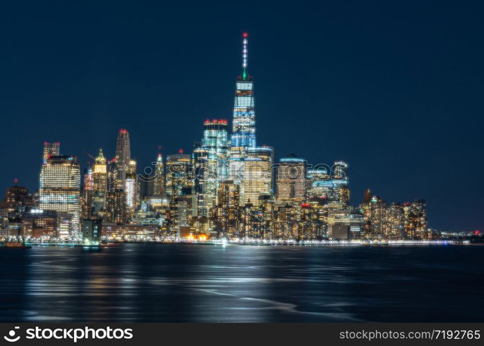 Scene of New york cityscape river side which location is lower manhattan which can see One world trade center at twilight time,USA,Taking from New Jersey,Architecture and building with tourist concept