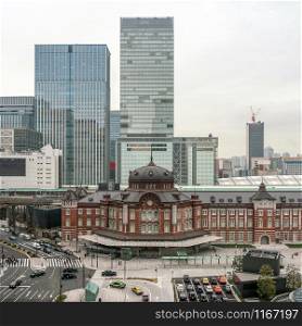 Scene of Tokyo railway station from terrace at afternoon time, architecture, landmark and transportation concept