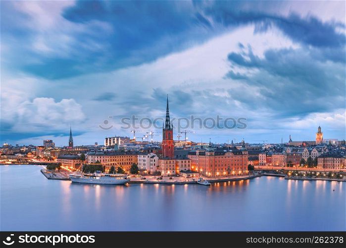 Scenic aerial panoramic view of Riddarholmen, Gamla Stan, in the Old Town in Stockholm at night, capital of Sweden. Gamla Stan in Stockholm, Sweden