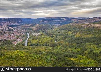 Scenic aerial view from drone of the big curve of the river near city, Yantra and Veliko Tarnovo, Bulgaria