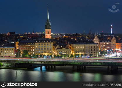 Scenic aerial view of Gamla Stan with German Church, in the Old Town in Stockholm at night, capital of Sweden. Gamla Stan in Stockholm, Sweden