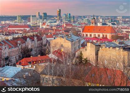 Scenic aerial view of the city at sunset. Vilnius. Lithuania.. Vilnius. Lithuania. Aerial view of the city at sunset.