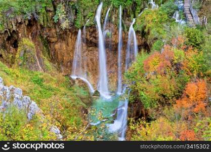Scenic autumn landscape with beautiful waterfall in the Plitvice Lakes National Park in Croatia