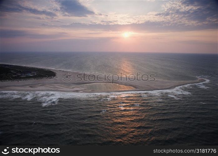 Scenic Bald Head Island North Carolina landscape of shoreline during sunrise.