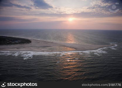Scenic Bald Head Island North Carolina landscape of shoreline during sunrise.
