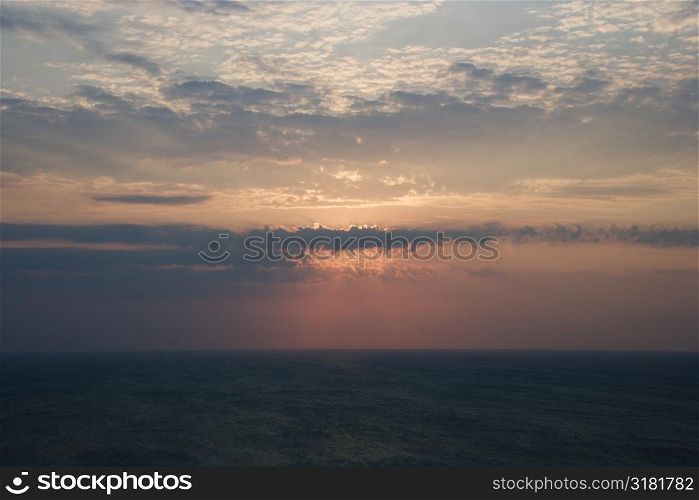 Scenic Bald Head Island North Carolina landscape of sunrise over ocean.