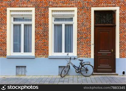 Scenic city view of Bruges street with bike, Belgium