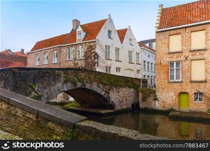 Scenic cityscape of the Green canal, Groenerei, and bridge in Bruges, Belgium