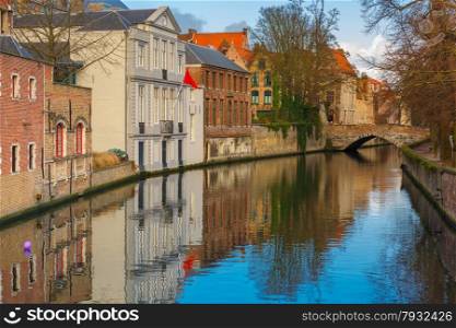 Scenic cityscape of the Green canal, Groenerei, and bridge in Bruges, Belgium