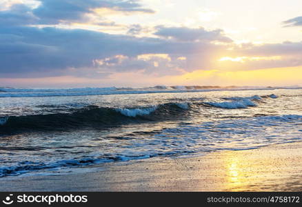 Scenic colorful sunset at the sea coast. Good for wallpaper or background image.