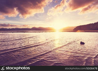 Scenic colorful sunset at the sea coast. Good for wallpaper or background image.