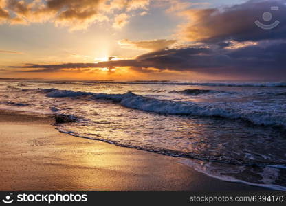 Scenic colorful sunset at the sea coast. Good for wallpaper or background image.