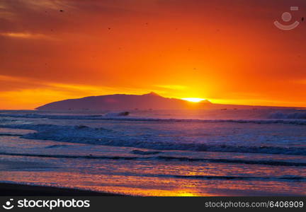 Scenic colorful sunset at the sea coast. Good for wallpaper or background image.