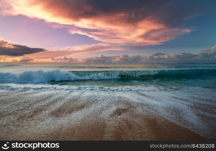 Scenic colorful sunset at the sea coast. Good for wallpaper or background image.