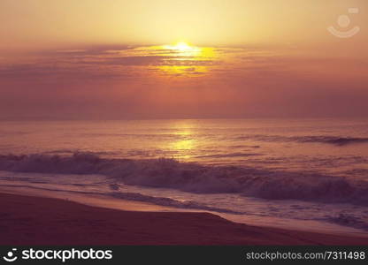 Scenic colorful sunset at the sea coast. Good for wallpaper or background image.