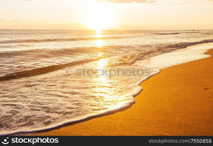 Scenic colorful sunset at the sea coast. Good for wallpaper or background image.