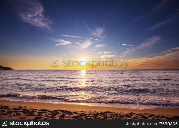 Scenic colorful sunset at the sea coast. Good for wallpaper or background image.