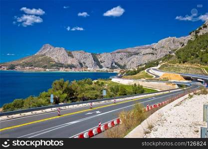 Scenic Dalamtian road by the sea in Omis view, Dalmatia region of Croatia