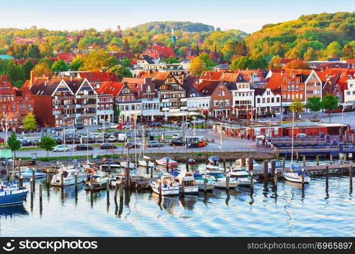 Scenic evening panorama of the Old Town pier architecture in Travemunde, Germany