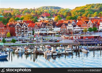 Scenic evening panorama of the Old Town pier architecture in Travemunde, Germany