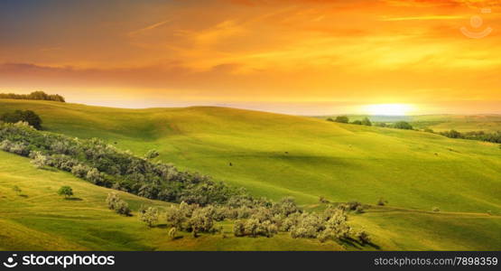 scenic fields, hills and sunrise
