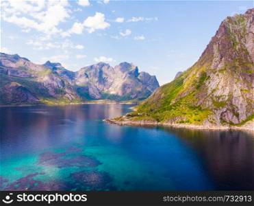 Scenic fjord landscape above the arctic circle, coast nature with sharp mountain peaks, Lofoten islands North Norway.. Fjord and mountains landscape. Lofoten islands Norway