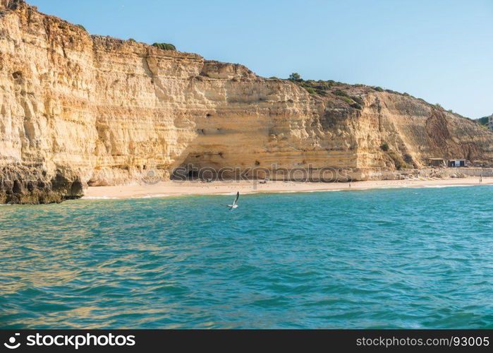 Scenic golden cliffs near Benagil, Lagoa. This beach is a part of famous tourist region Algarve