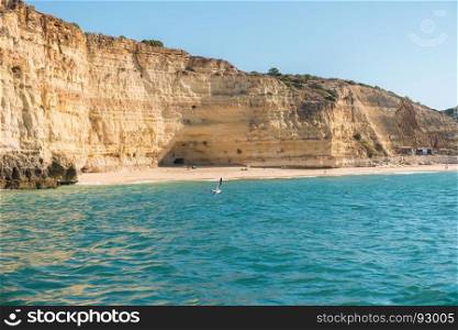Scenic golden cliffs near Benagil, Lagoa. This beach is a part of famous tourist region Algarve
