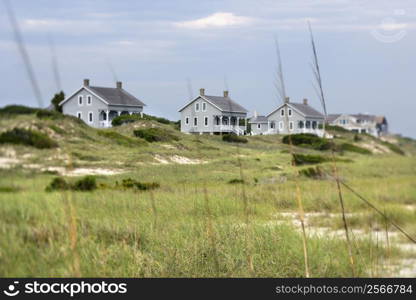 Scenic houses at coast of Bald Head Island, North Carolina.