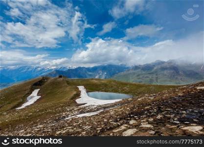 Scenic Indian Himalayan landscape scenery in Himalayas with small lake. Himachal Pradesh, India. Indian Himalayan landscape in Himalayas