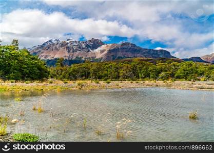 Scenic landscape of Los Glaciares National Park with beautiful mountain and river in El Chalten, Argentina