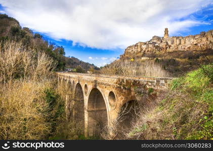 Scenic medeival village (borgo) Pitigliano in Tuscany, Italy. view with old bridge