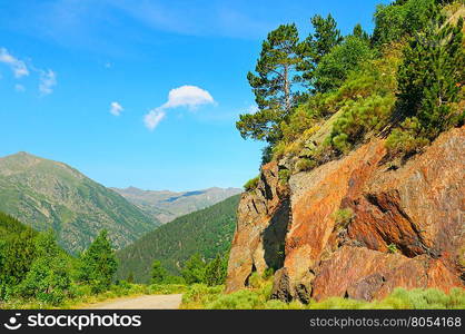 Scenic mountain landscape with cliff and pines