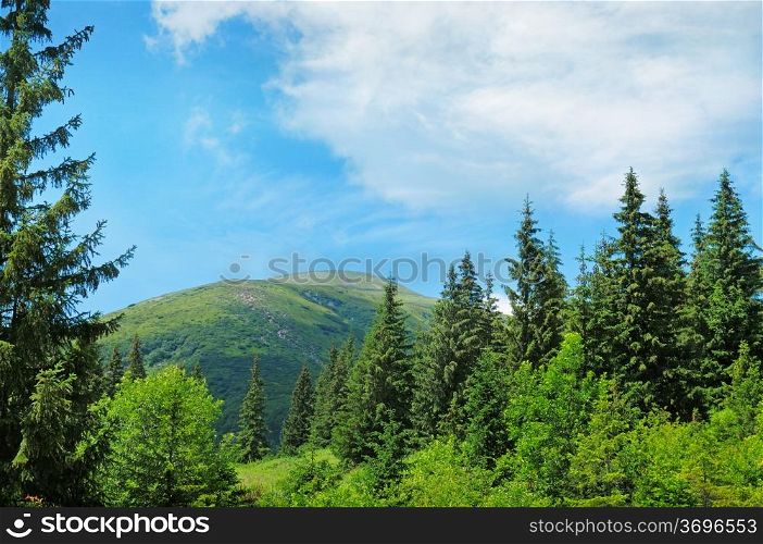scenic mountain peaks against the blue sky