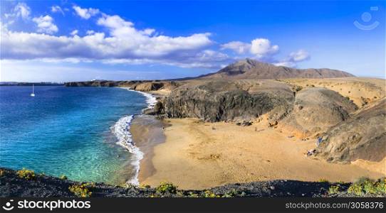 Scenic nature and beautiful beaches of volcanic Lanzarote. Papagayo beach. Canary islands. Golden Beaches of Lanzarote island. Papagayo. Canary islands of Spain