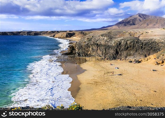 Scenic nature and beautiful colorful beaches of volcanic Lanzarote. Papagayo beach. Canary islands. Golden Beaches of Lanzarote island. Papagayo. Canary islands of Spain