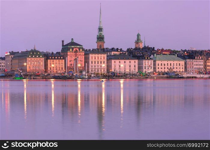 Scenic panoramic view of Gamla Stan, in the Old Town in Stockholm at night, capital of Sweden. Gamla Stan in Stockholm, Sweden