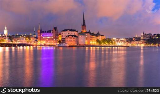 Scenic panoramic view of Riddarholmen, Gamla Stan, in the Old Town in Stockholm at night, capital of Sweden. Gamla Stan in Stockholm, Sweden